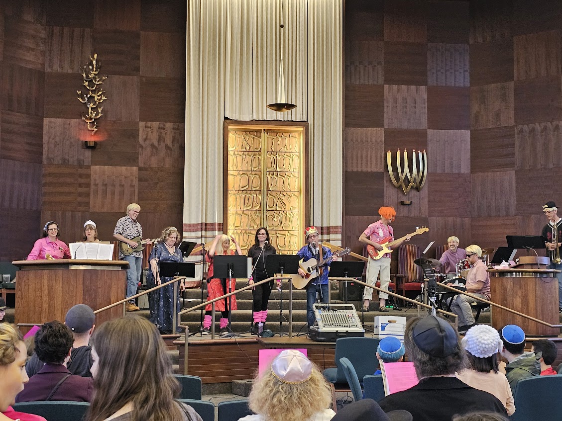 Rabbi and the TBA band in costume for Rock'n Roll Purim